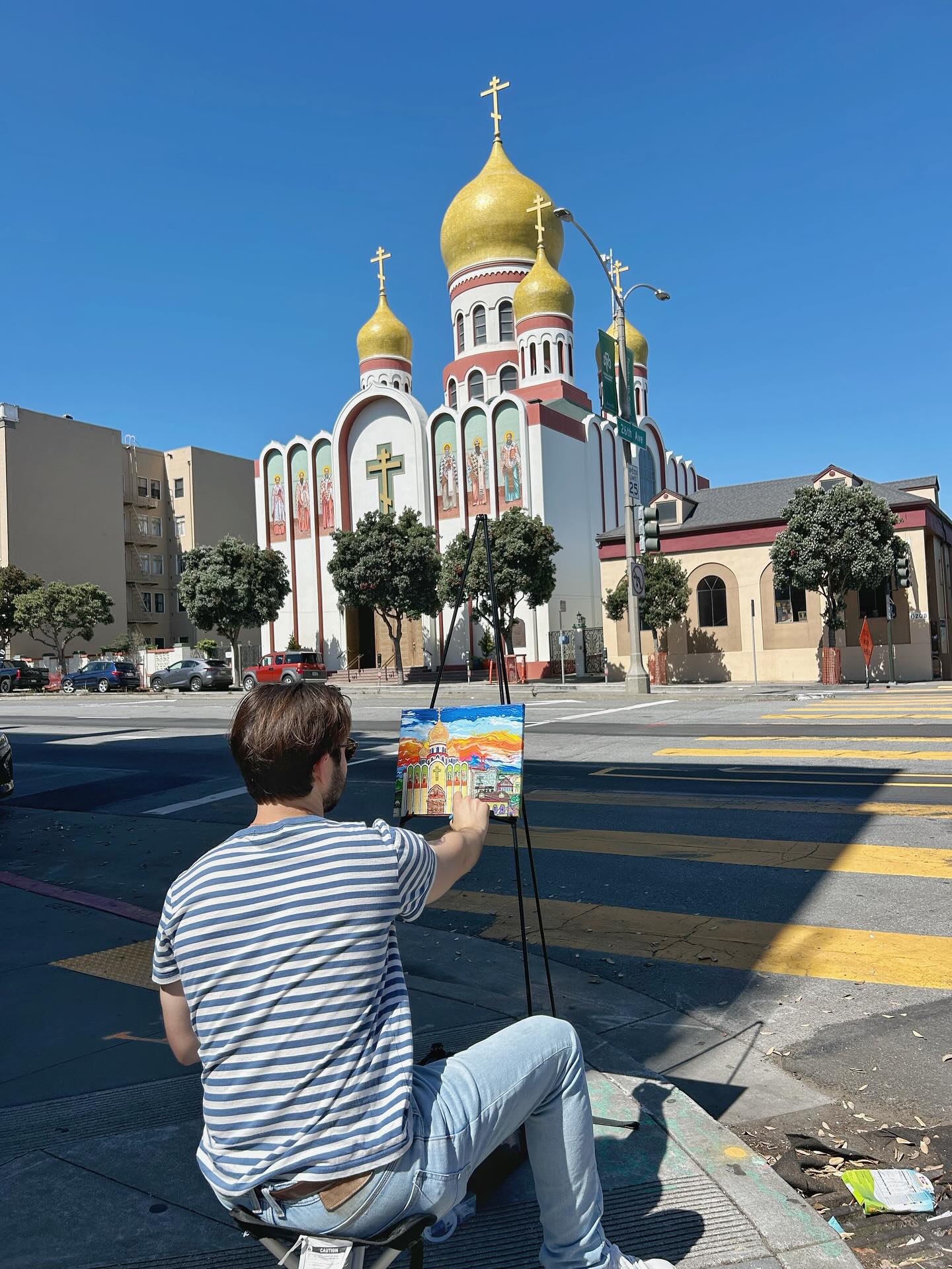 Anthony painting outdoors